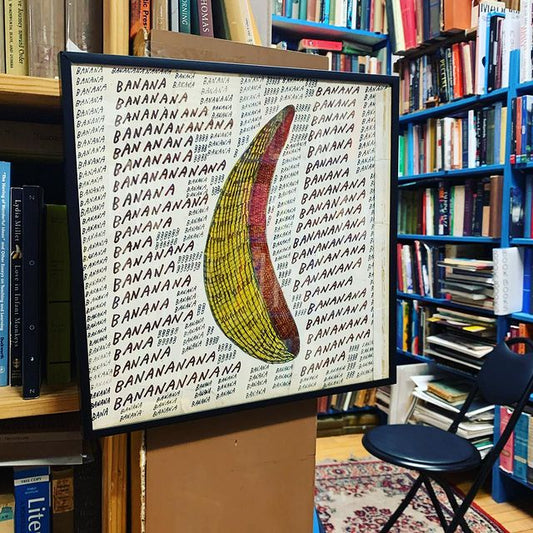 Artwork hanging at Dogtown Books